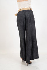 Pantalone palazzo effetto lino delavé con cintura intrecciata.
