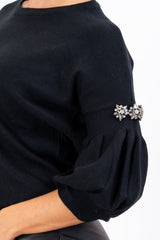 Maglia Balloon Chic con spilla gioiello