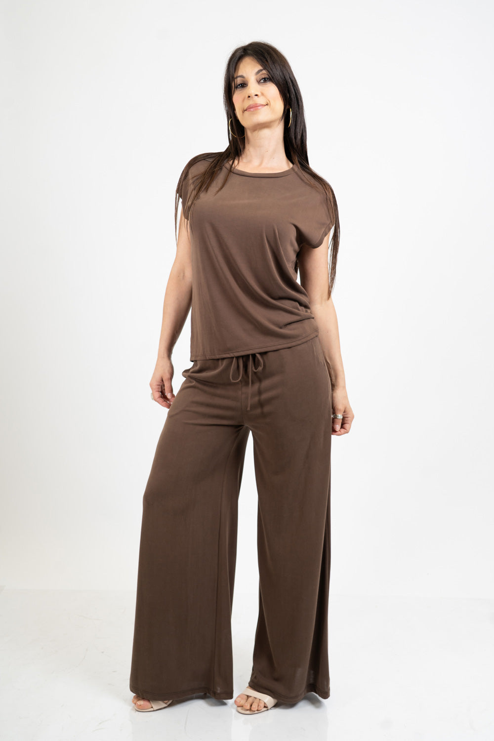 Pantalone palazzo in viscosa elasticizzata con coulisse Made in Italy.