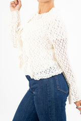 Cardigan goffrato con fiocco e maniche svasate