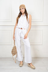 modella indossando Pantalone dritto in lino e viscosa coordinato colore Bianco Unica