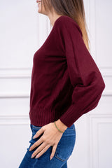modella indossando Maglia Evania girocollo con maniche a palloncino colore