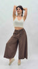 Pantalone balloon cropped in misto lino con cintura intrecciata