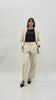 Pantalone palazzo in ecopelle morbida con tasche e cuciture jeans - Beige
