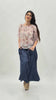 Blusa in tencel fluido con scollo arricciato regolabile e manica morbida fantasia floreale