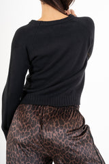 modella indossando Maglione sportivo con maniche raglan e bordo a coste colore