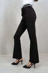 Pantalone flare in tessuto tecnico elasticizzato Nero