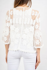 Giacchetto crochet a rete floreale.