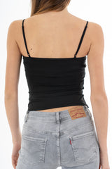 modella indossando Top effetto bustier in maglina elasticizzata con cuciture a vista e passamaneria colore