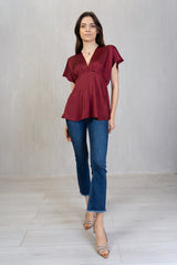 Blusa in raso con scollo a V e taglio sagomato