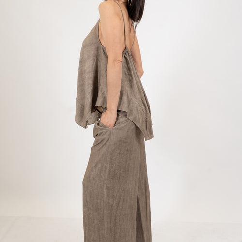 Pantalone palazzo effetto lino delavé con cintura intrecciata.