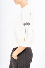 Maglia Balloon Chic con spilla gioiello