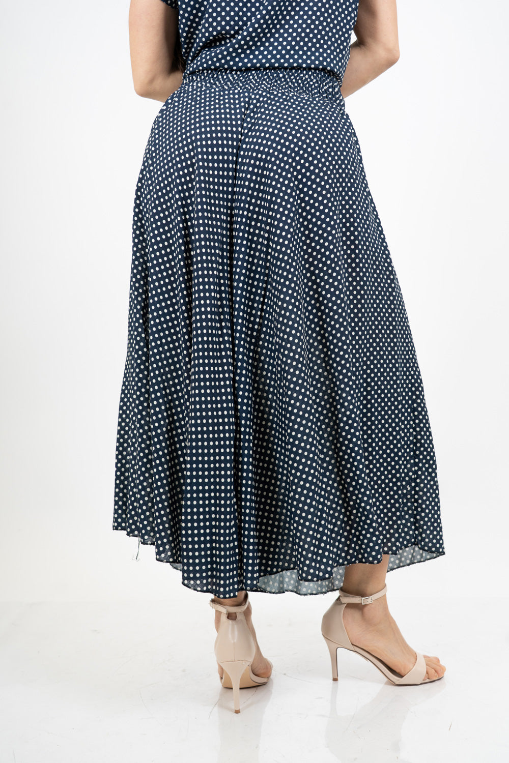 Pantagonna ampia in viscosa a pois con vita alta e retro elasticizzato.