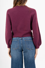 modella indossando Maglione morbido con manica ampia e bordo a costine colore