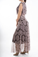 modella indossando Completo top a palloncino e gonna lunga in microrete Feather Leaf colore
