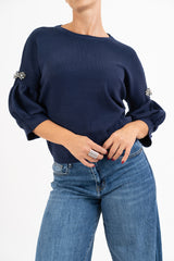 Maglia Balloon Chic con spilla gioiello