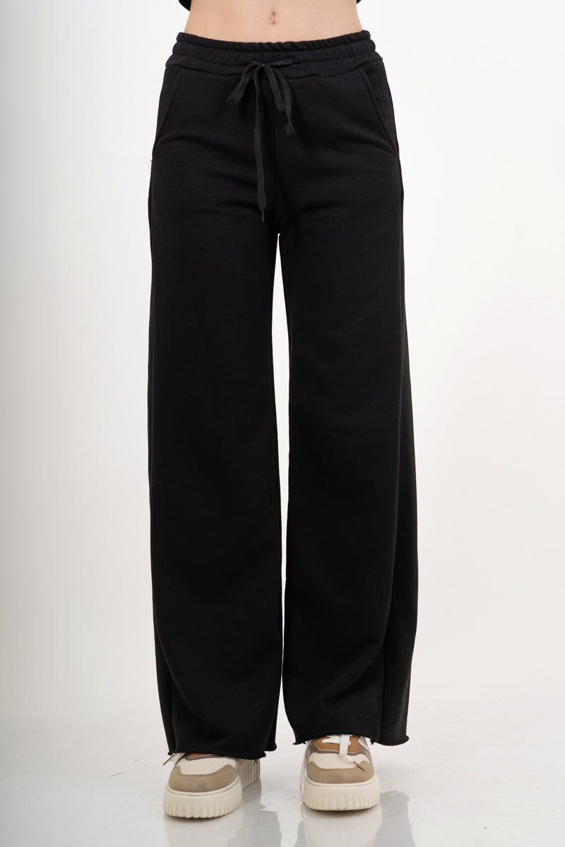 modella indossando Pantalone palazzo in felpa elasticizzata con coulisse colore