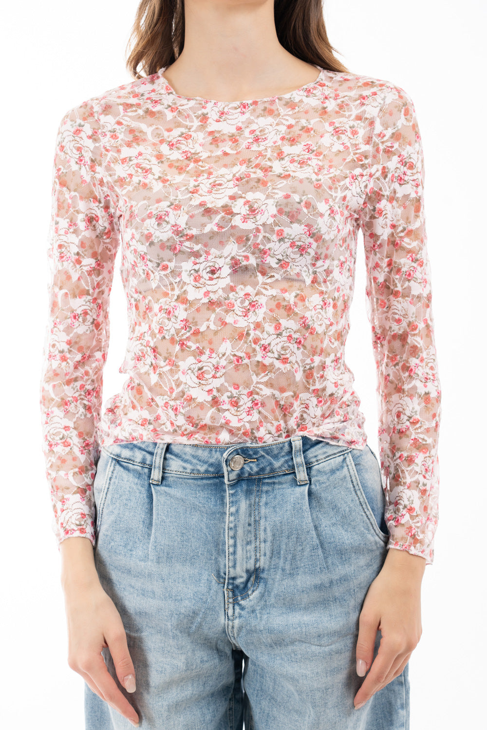 modella indossando Maglia in pizzo elasticizzato trasparente a fiori manica lunga colore Rosa Unica
