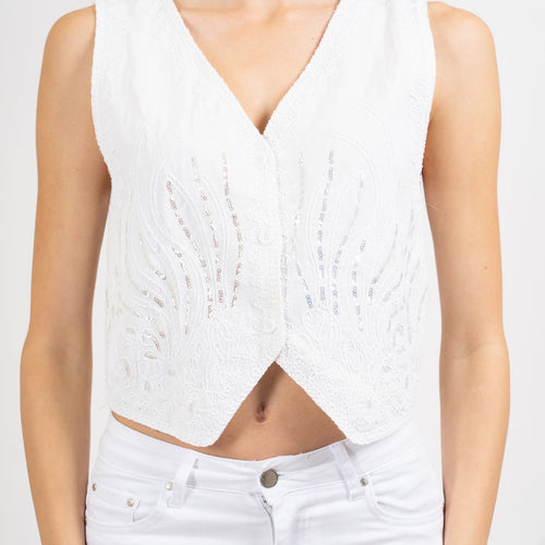modella indossando Gilet corto ricamato con paillettes colore Bianco Unica