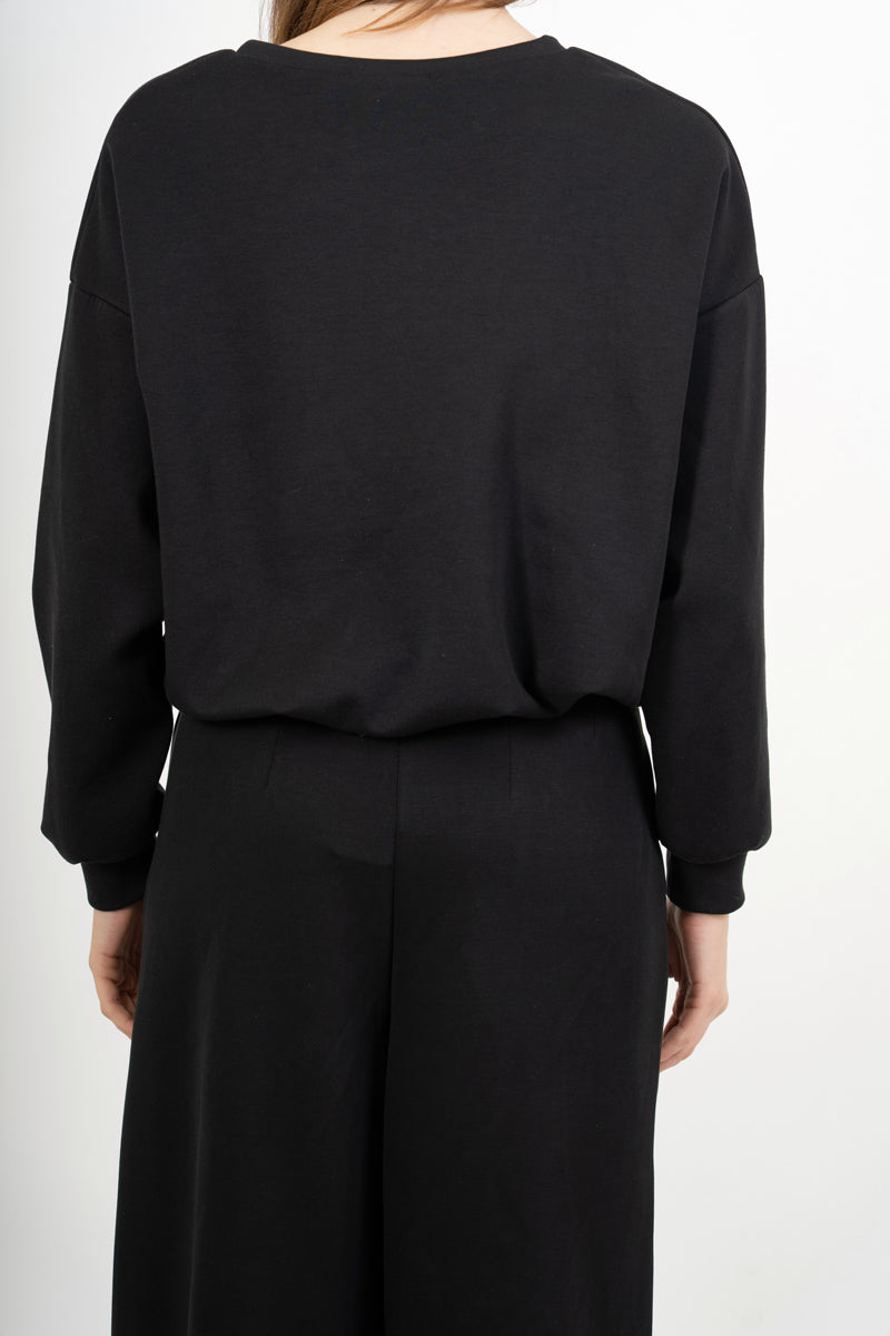 modella indossando Maglia felpa over con spalla scesa ed effetto palloncino colore