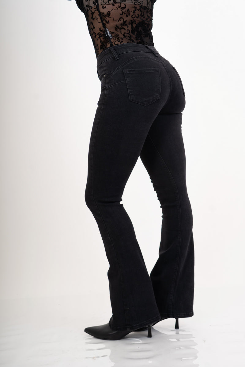 Jeans nero delavè push-up elasticizzato a zampa