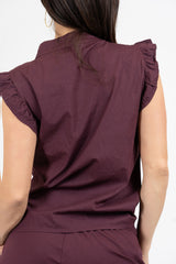 Camicia smanicata con rouge in cotone elasticizzato.