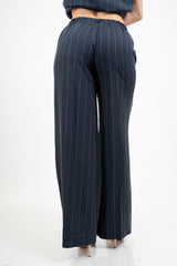 Pantalone palazzo gessato a righe con elastico in vita Made in Italy.